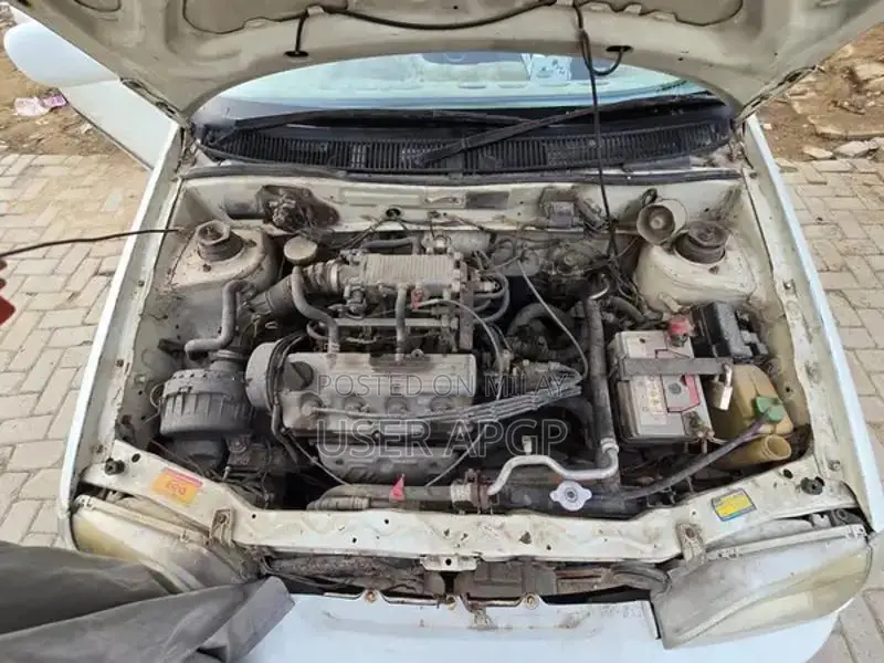 Suzuki Cultus 2012 VXR White Compact Sedan