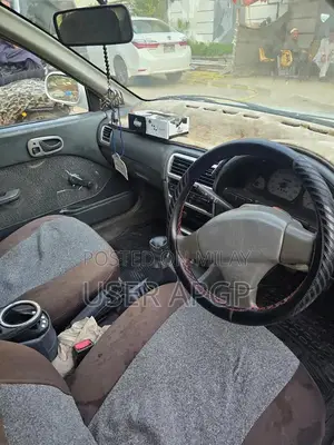 Suzuki Cultus 2012 VXR White Compact Sedan