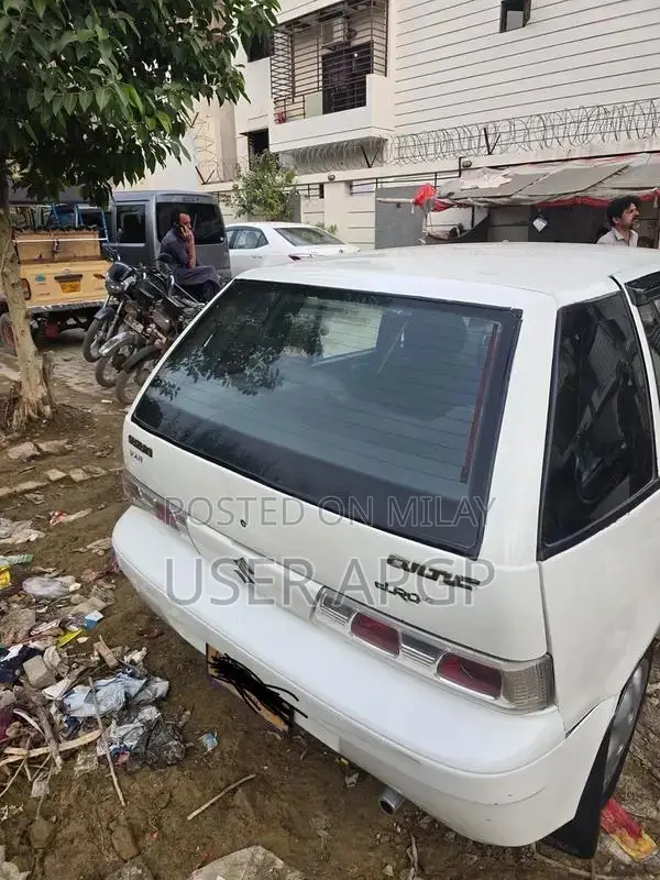 Suzuki Cultus 2012 VXR White Compact Sedan
