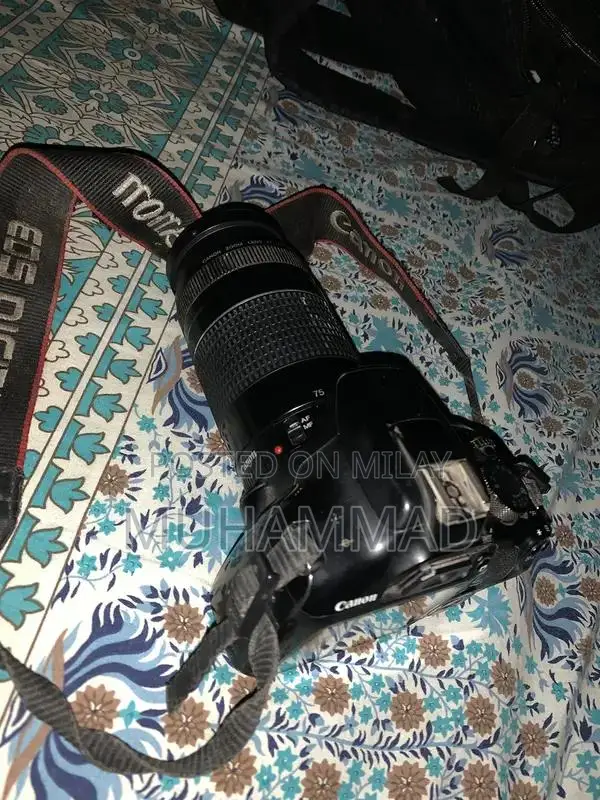 Canon EOS 1300D DSLR Camera with 75-300mm Zoom Lens