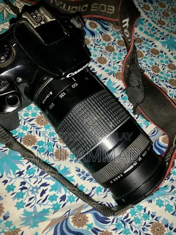 Canon EOS 1300D DSLR Camera with 75-300mm Zoom Lens