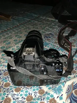 Canon EOS 1300D DSLR Camera with 75-300mm Zoom Lens