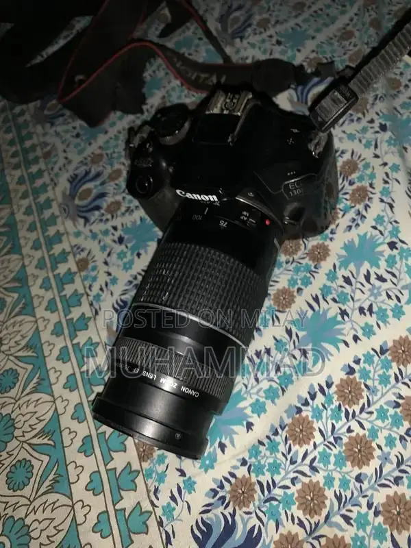 Canon EOS 1300D DSLR Camera with 75-300mm Zoom Lens