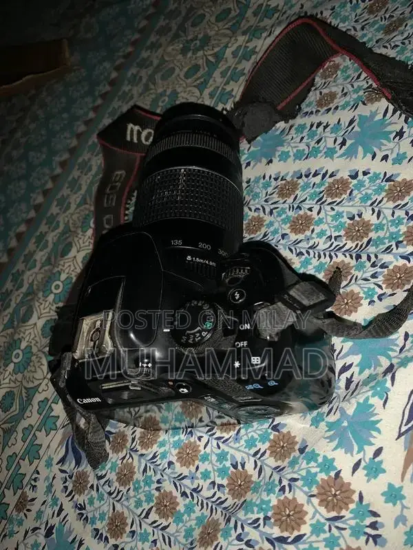 Canon EOS 1300D DSLR Camera with 75-300mm Zoom Lens