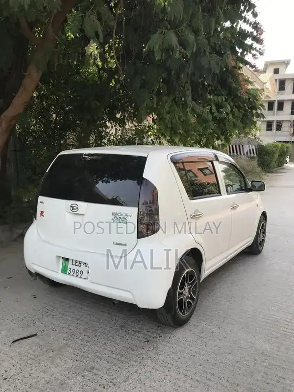 Daihatsu Boom Compact Sedan 2006 Model