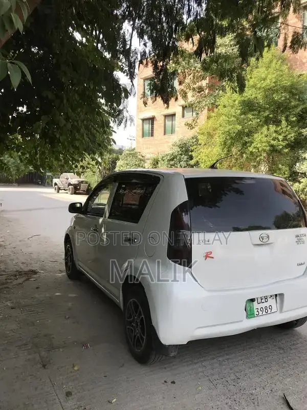 Daihatsu Boom Compact Sedan 2006 Model