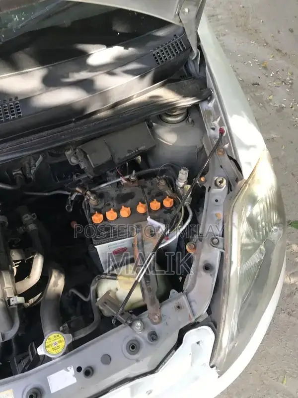 Daihatsu Boom Compact Sedan 2006 Model