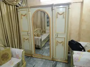 Photo - Wooden Cupboard with Minor Damage - Repairable Mirror Door