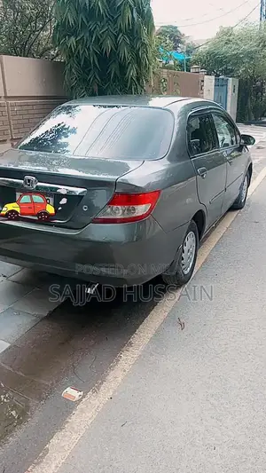 Honda City 2004 Sedan - Reliable Compact Car with New Tires