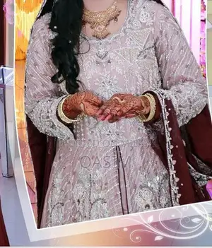 Pastel Pink Bridal Maxi Gown with Intricate Hand Embroidery