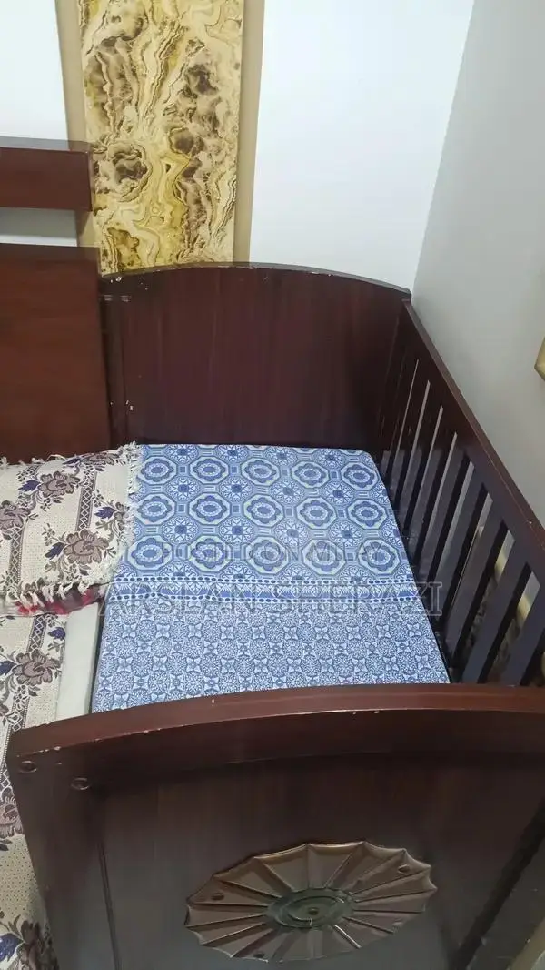 Sturdy Wooden Baby Cot - Excellent Condition