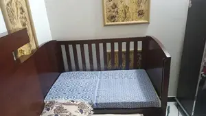 Sturdy Wooden Baby Cot - Excellent Condition