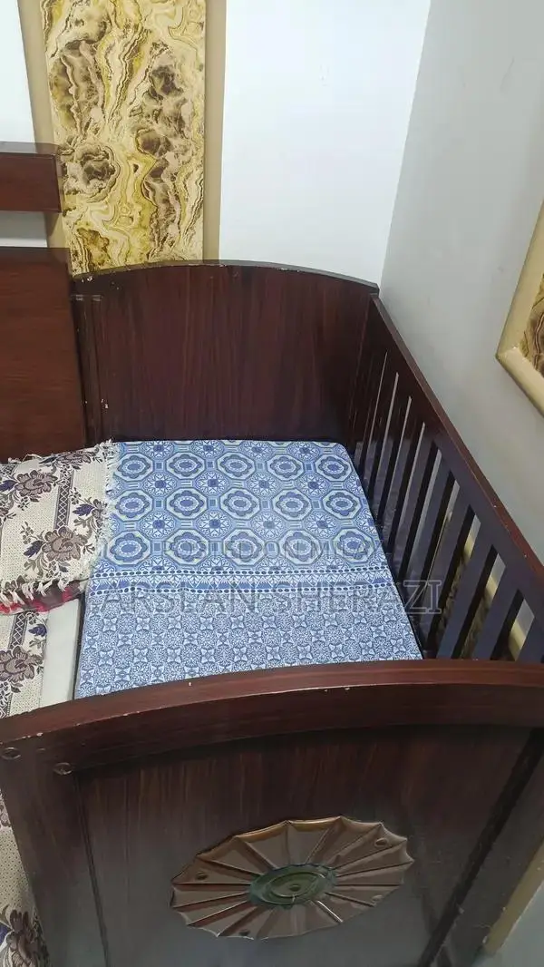 Sturdy Wooden Baby Cot - Excellent Condition