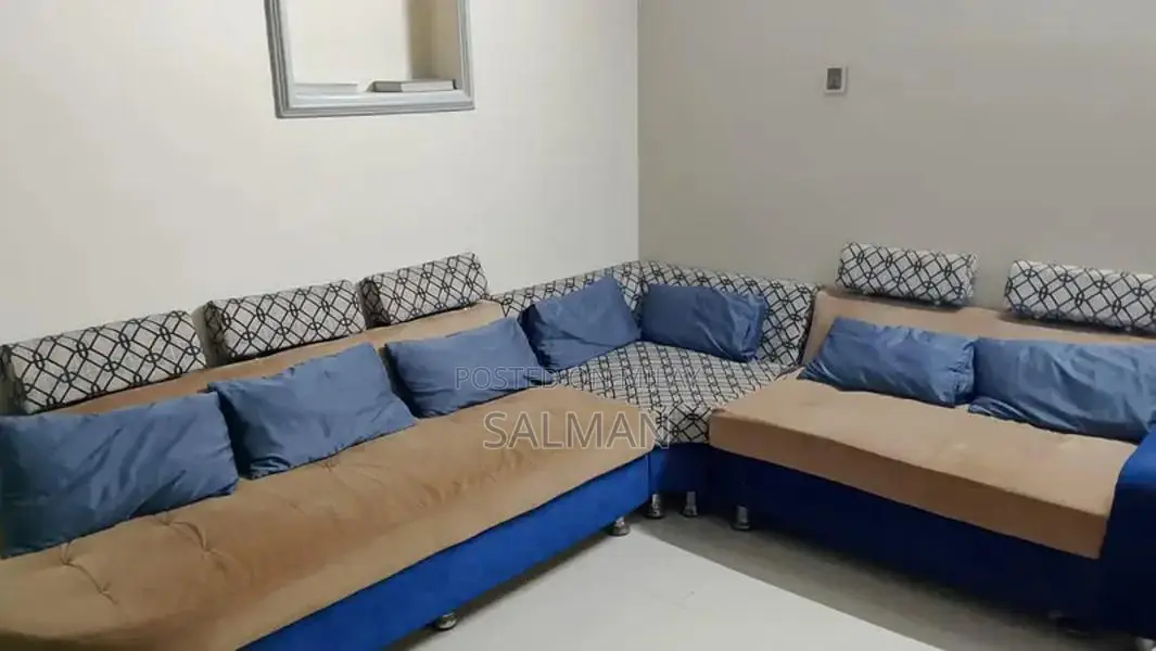 L-Shaped 7-Seater Sectional Sofa with Decorative Pillows