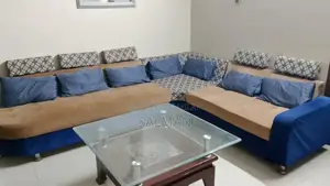 L-Shaped 7-Seater Sectional Sofa with Decorative Pillows