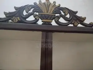 Chinoti 4-Door Wooden Showcase with 2 Drawers and 4 Cabinets