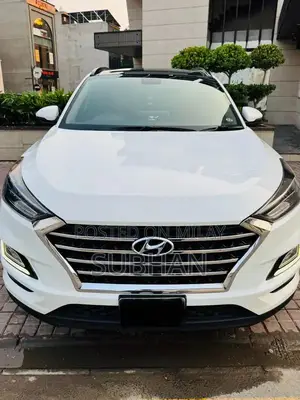 Photo - 2023 Hyundai Tucson FWD SUV - Polar White