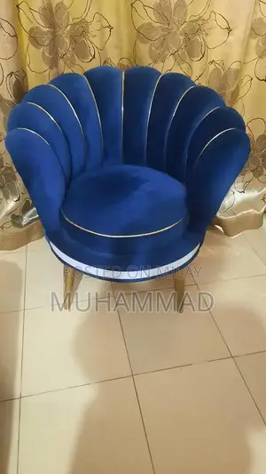 Photo - Elegant Wooden Chair - Luxury Single Seating Option