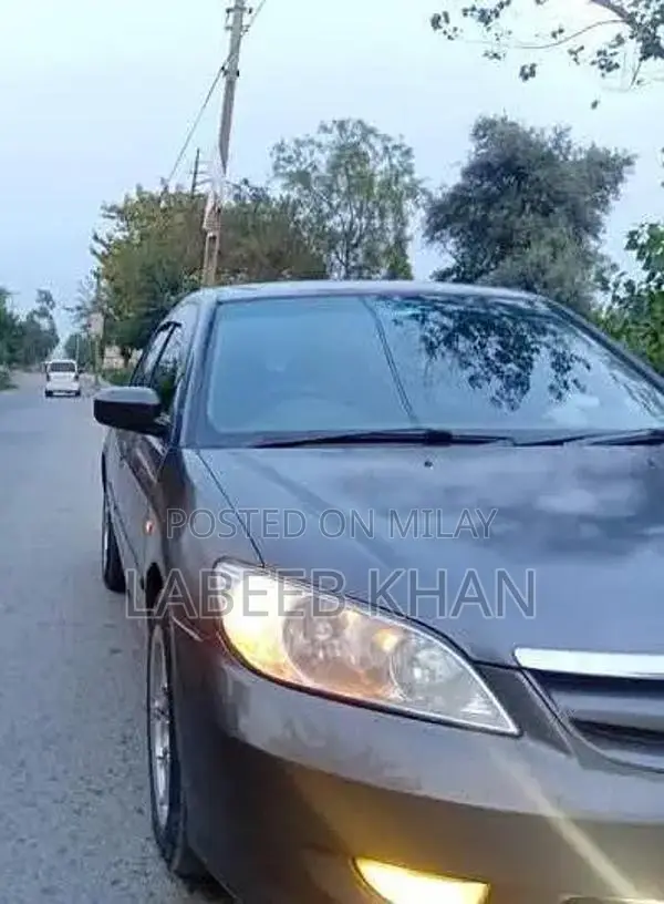 Honda Civic ES Sedan - Well-Maintained Sporty Sedan