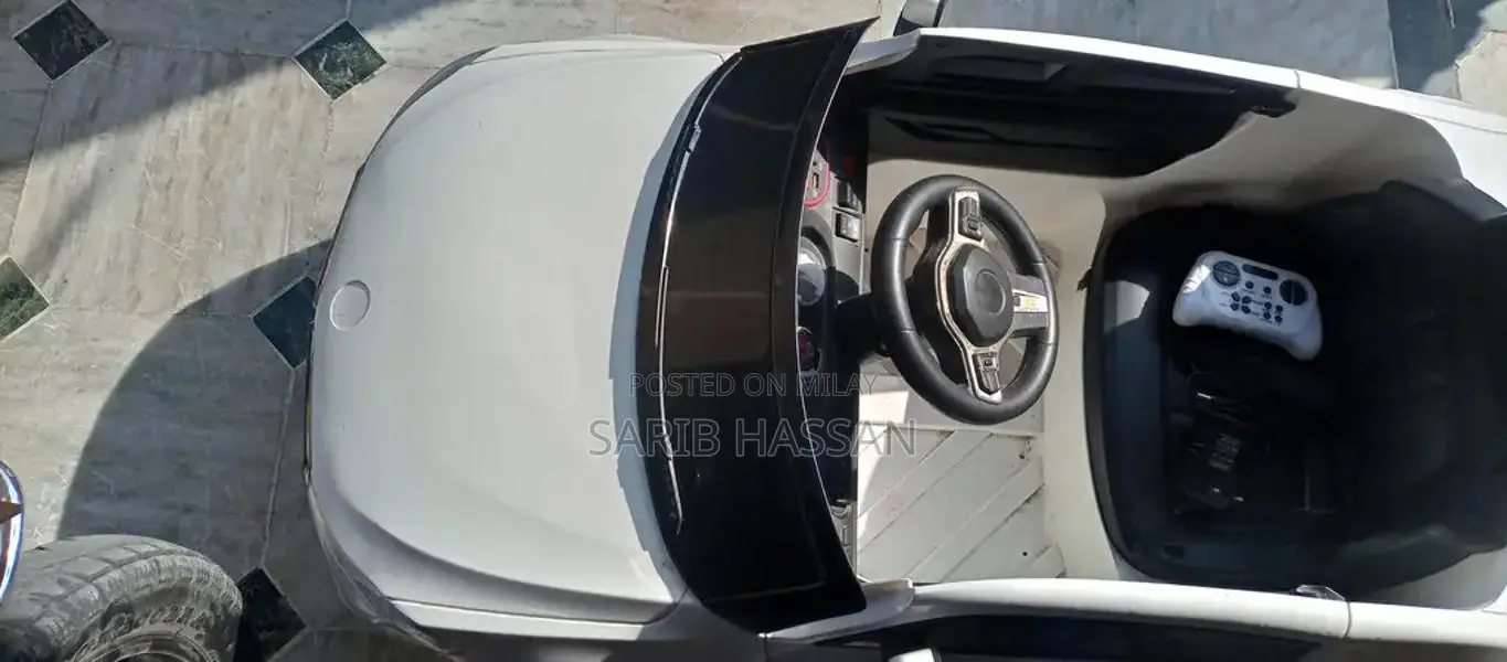 Kids Electric Ride-On Car with Remote Control and Seating