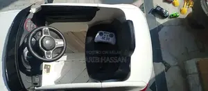 Kids Electric Ride-On Car with Remote Control and Seating