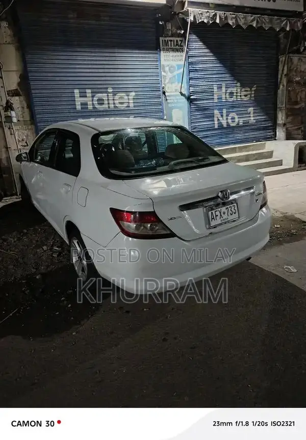 Honda City Automatic Sedan with Disk Brakes and Original Paint