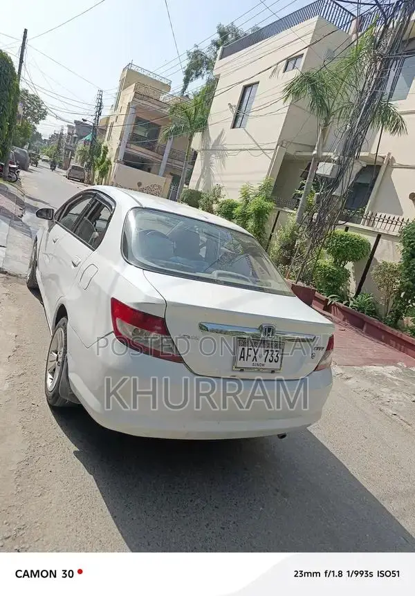 Honda City Automatic Sedan with Disk Brakes and Original Paint