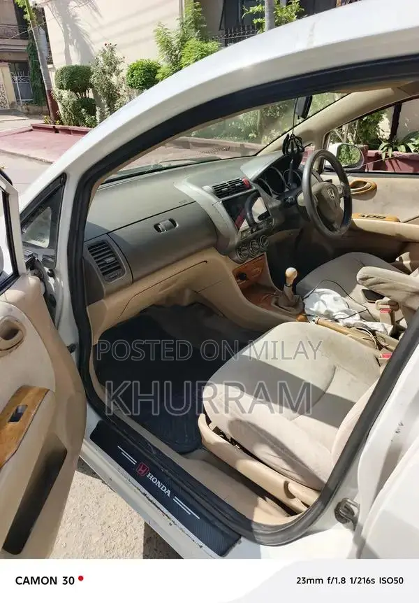 Honda City Automatic Sedan with Disk Brakes and Original Paint