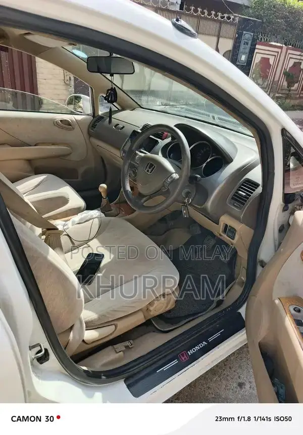 Honda City Automatic Sedan with Disk Brakes and Original Paint