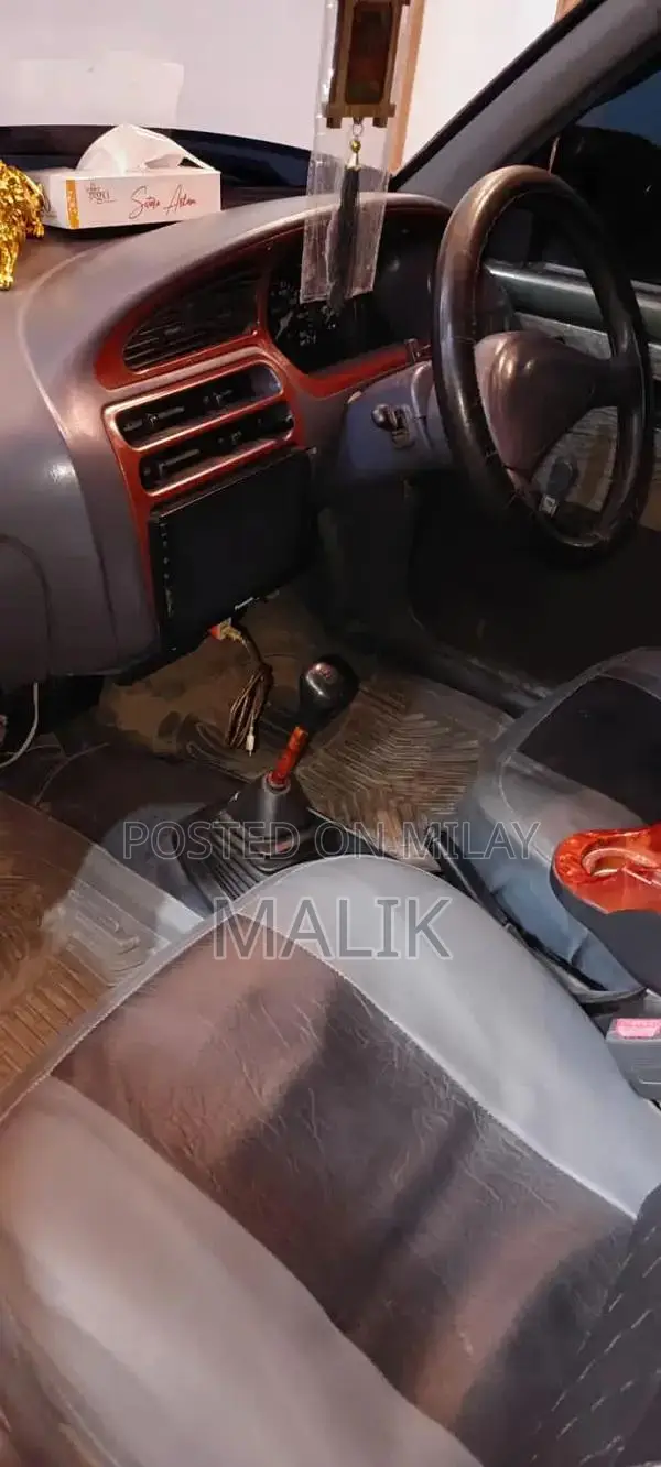 2011 Coure Compact City Car - Well Maintained Vehicle