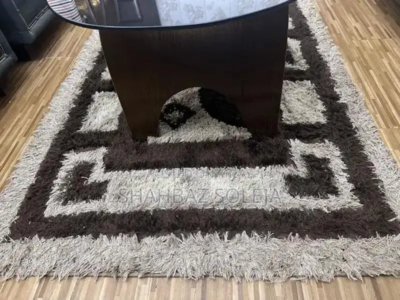 Dark Brown Glass Tea Table with Matching Area Rug