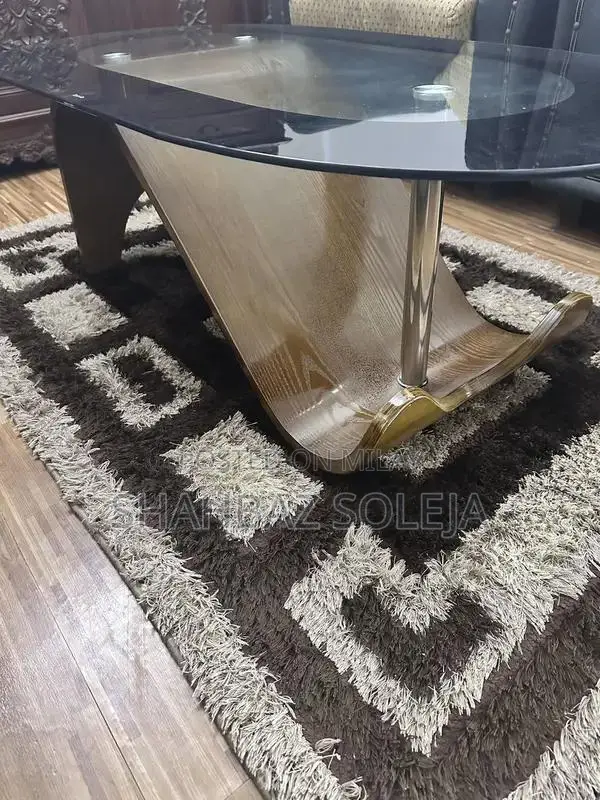 Dark Brown Glass Tea Table with Matching Area Rug