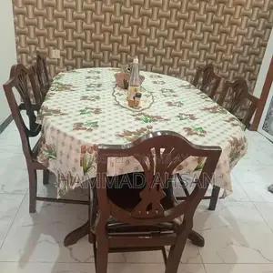 Photo - Wooden Dining Table with 5 Matching Chairs