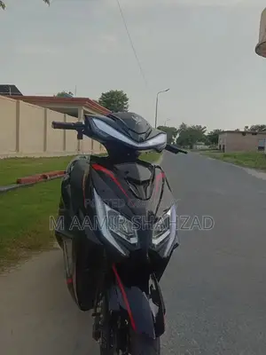 Photo - Zhongfa Y1 Electric Scooty with Long-Range Battery