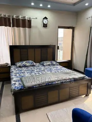 Photo - Solid Wood Bedroom Set with Bed Frame, Mattress, and Stools