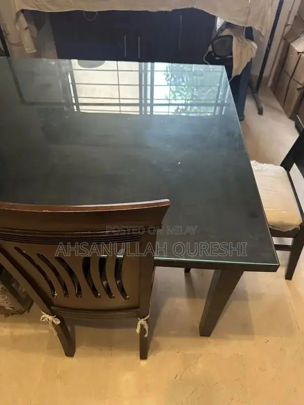 Solid Wood Dining Table with 4 Seat Capacity