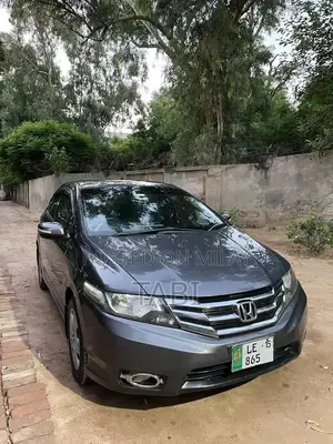 Photo - Honda City Sedan 2015 - Well-Maintained Compact Car