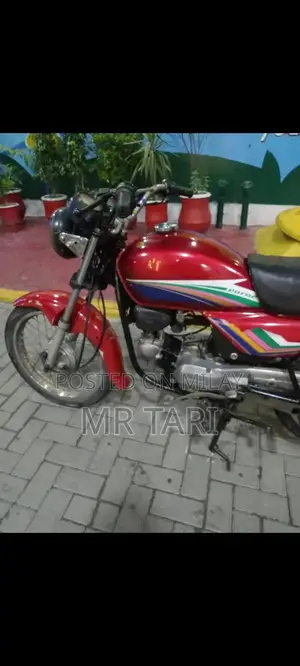 Photo - 2006 Honda 100 Motorcycle