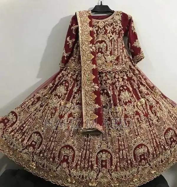 Mehroon Net Bridal Lehenga with Matching Jewelry Set