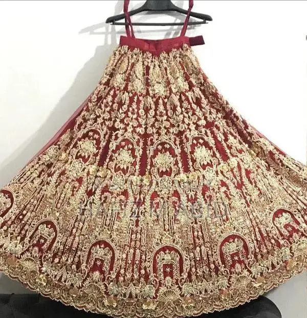 Mehroon Net Bridal Lehenga with Matching Jewelry Set