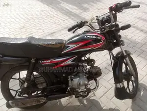 Photo - Unique 100cc Motorcycle - Golden Number, Low Mileage, One-Owner Bike