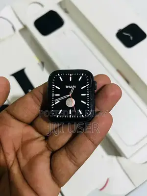 Photo - Apple Watch Series 5 44mm Smartwatch with GPS and Health Tracking