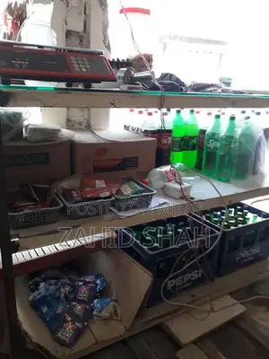 Photo - Solid Wall Rack with Heavy Glass Top Counter