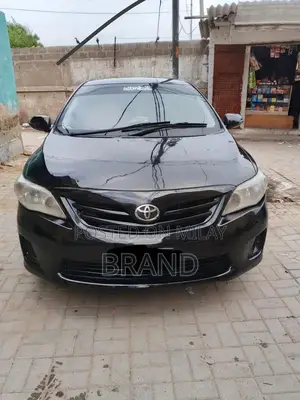 Photo - 2011 Toyota Corolla XLI Sedan - Well-Maintained Sedan