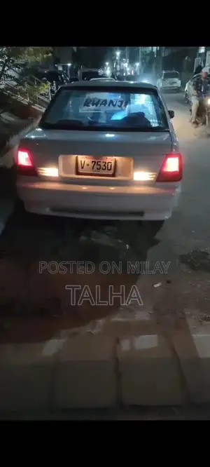 Photo - Suzuki Margalla Sedan - Reliable Compact Car with Air Conditioning