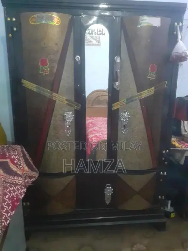 Used Wooden Armoire in Good Condition