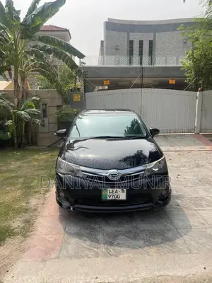 Photo - Toyota Axio Hybrid Fielder WXB Top Trim Wagon