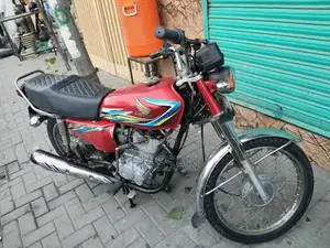 Photo - Honda 125 Motorcycle Service Manual and Original Documents