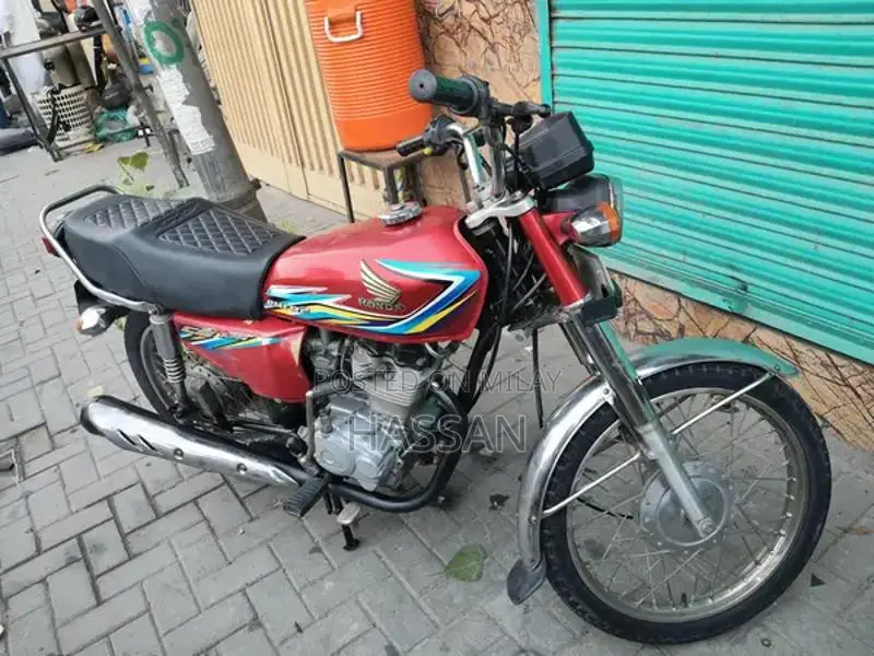 Honda 125 Motorcycle Service Manual and Original Documents