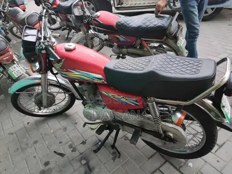 Honda 125 Motorcycle Service Manual and Original Documents